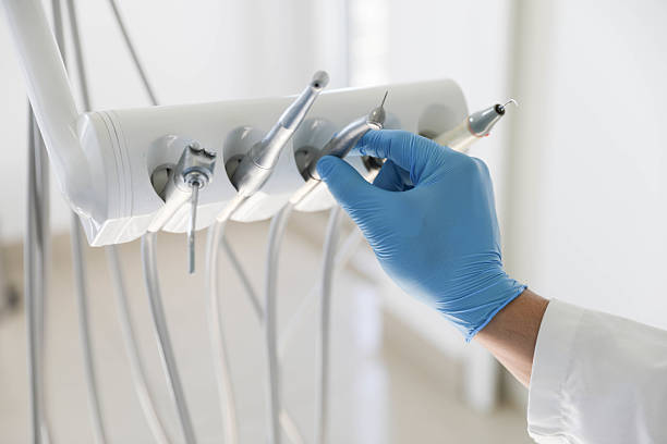 Professional Tooth Extraction technician working in Kennewick, WA